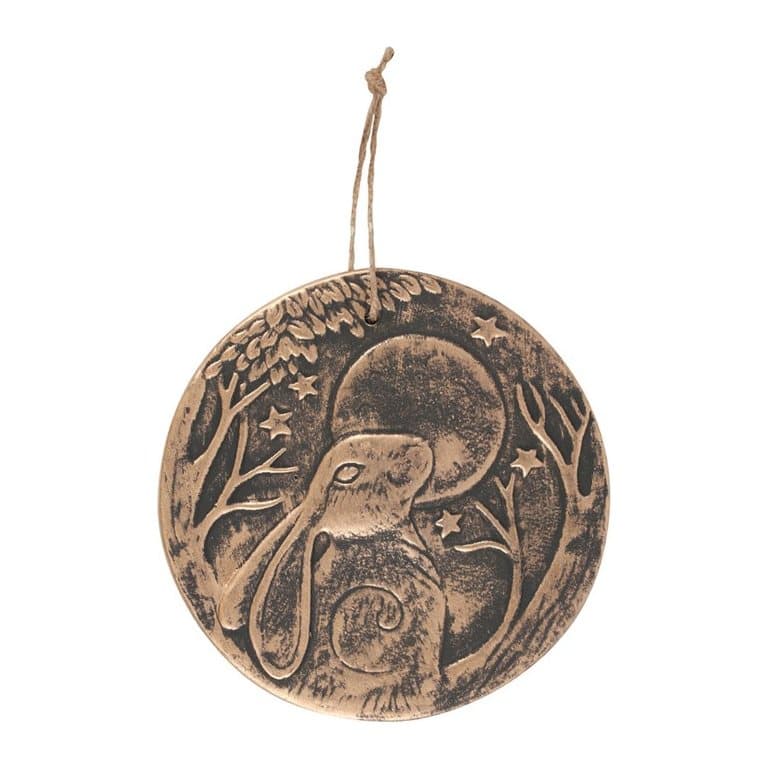 Circular terracotta plaque with a moon gazing hare and a copper effect finish