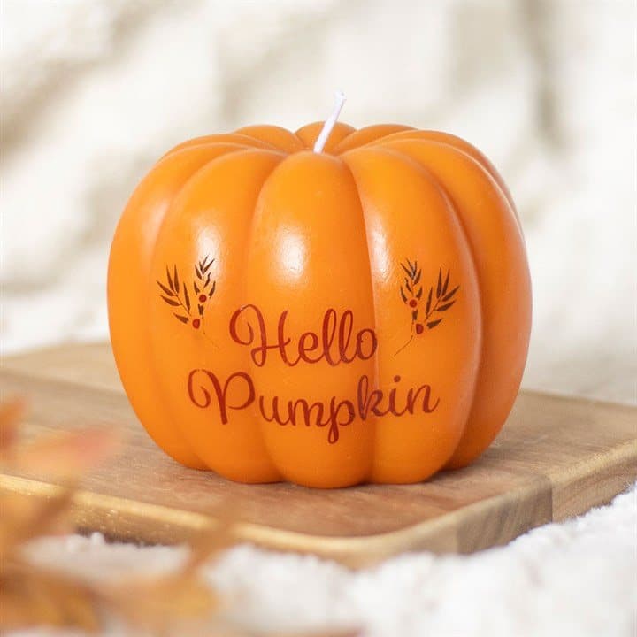 Pumpkin-shaped candle with Hello Pumpkin text