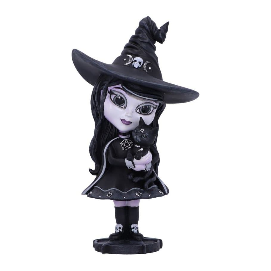 Witch figurine in black cape and hat cuddling a cat on a pentagram stand