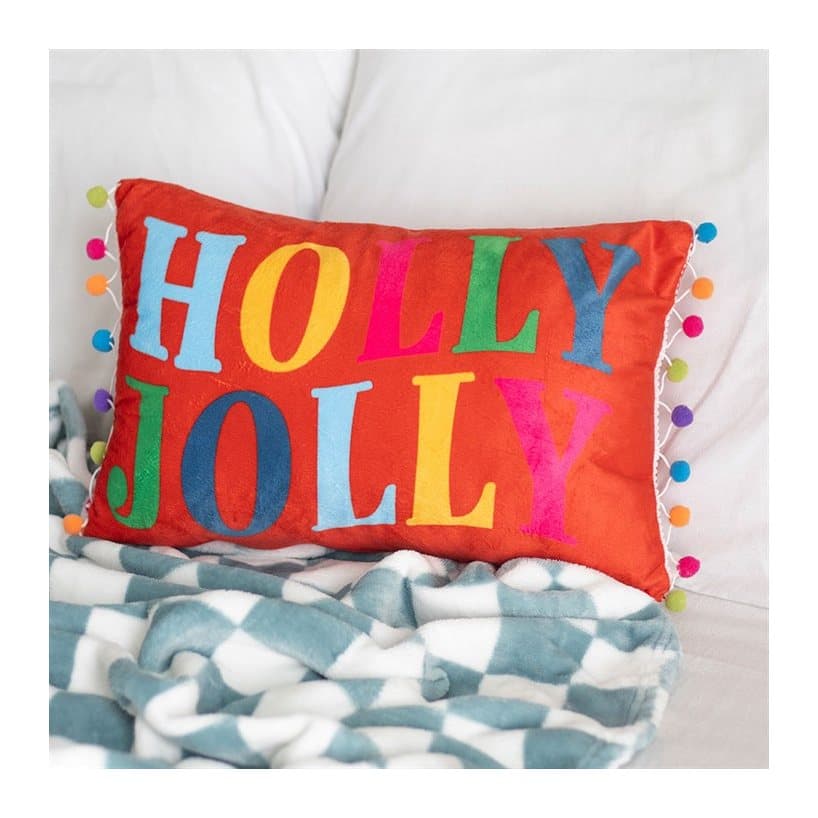 Red Holly Jolly cushion with pom poms