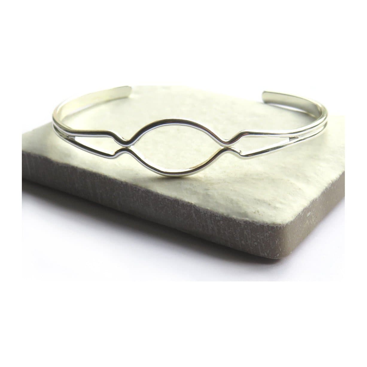 Silver hope bangle with a simple design, shown against a plain background.