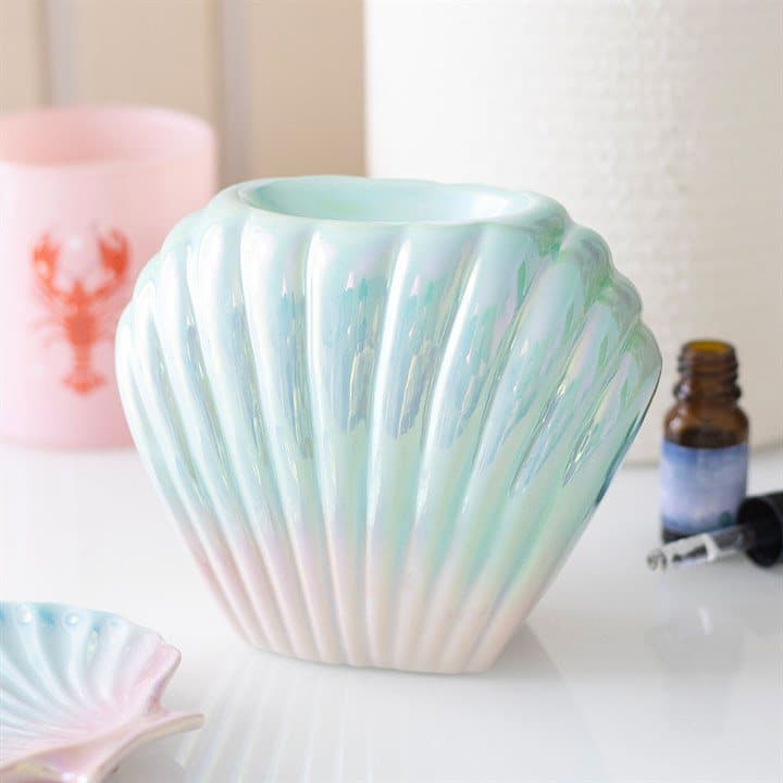Shell-shaped ceramic oil burner with an iridescent glaze