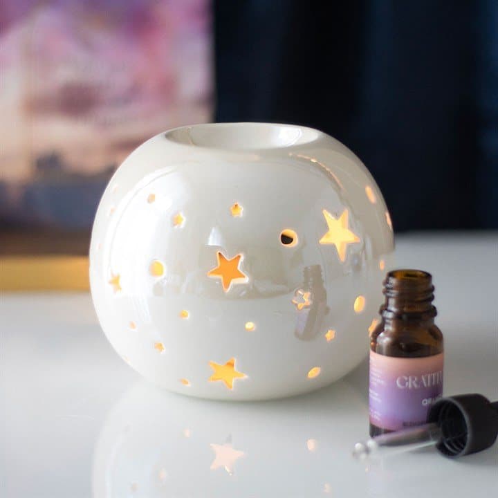 Iridescent star oil burner