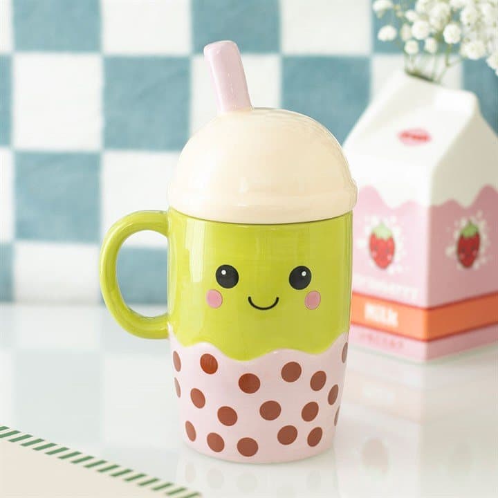 Ceramic bubble tea mug with pink straw, domed lid and smiling face