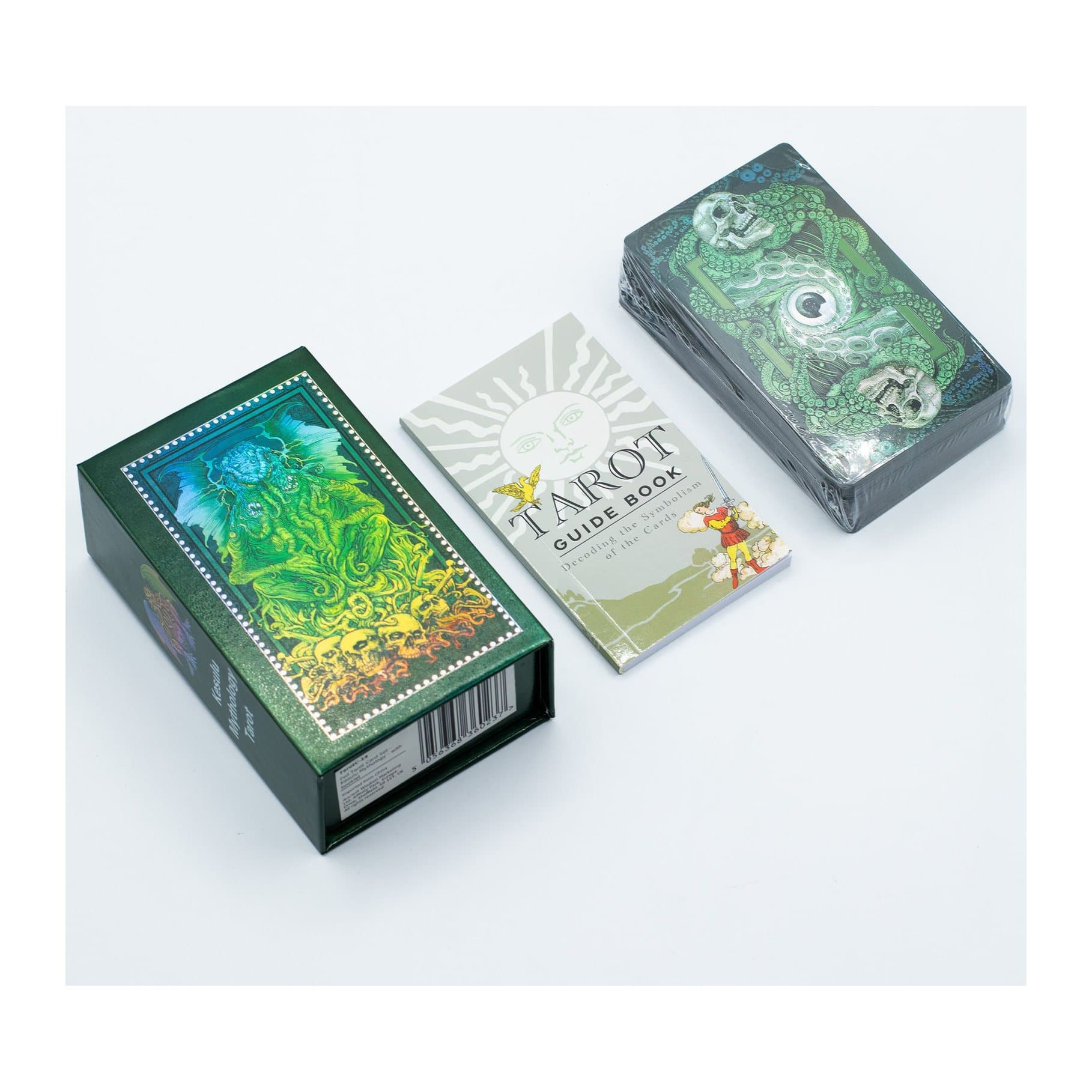 Green and gold Kesulu tarot deck in its box