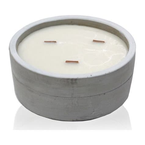 Large round concrete candle with a wooden wick