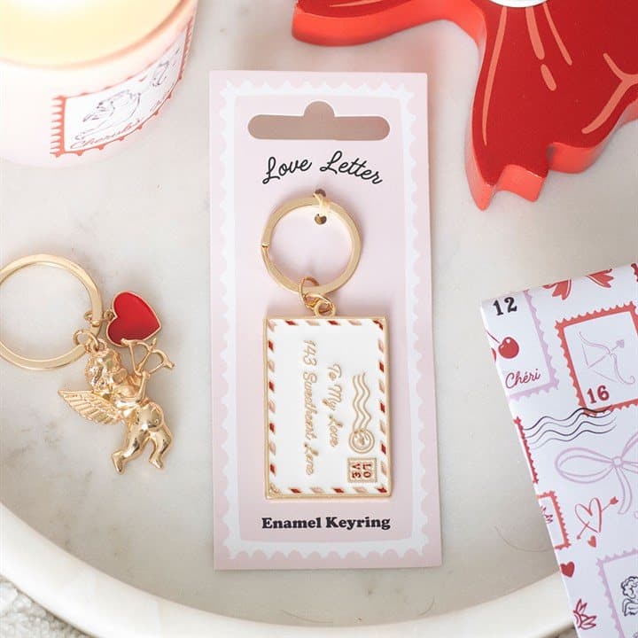 Enamel love letter keyring on a cardboard backing card with a Euro hook