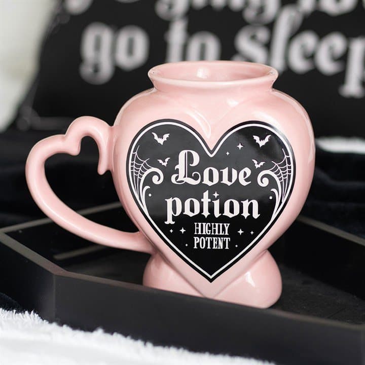 Ceramic mug shaped like a Love Potion bottle with pink details