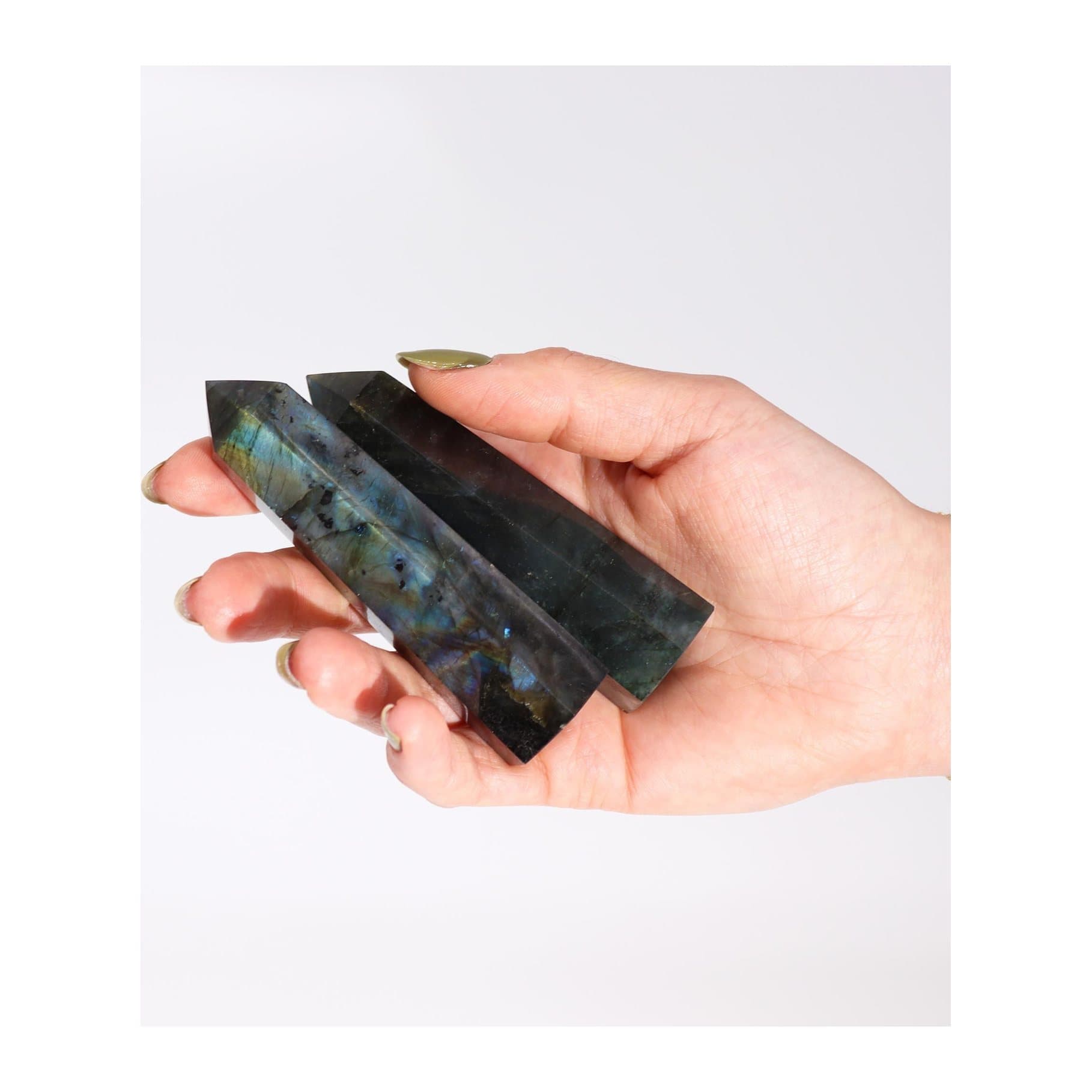 Madagascar labradorite point with shimmering blue, green and gold colours