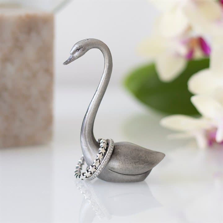 Small iron ring holder shaped like an elegant swan