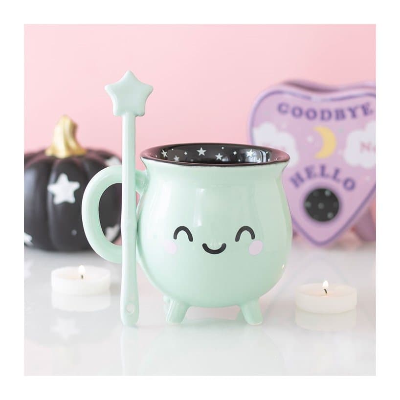 Mint green cauldron mug with a wand