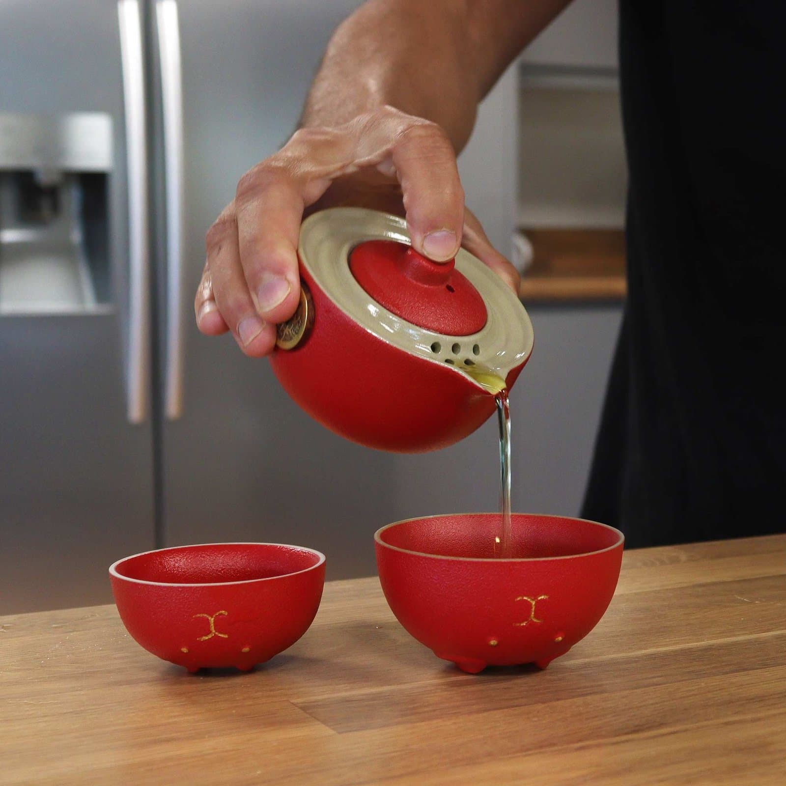 Red money cat teapot with two cups