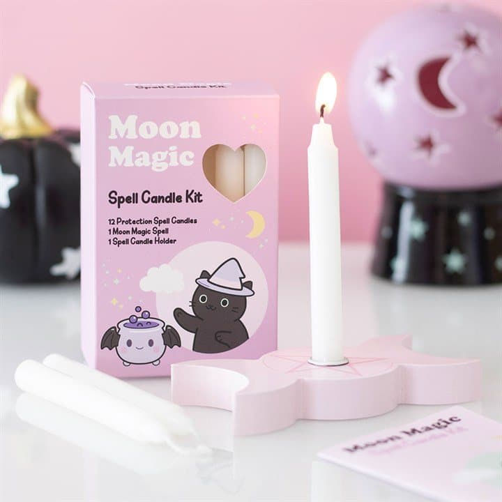 Spell candle kit with white candles, a wooden holder and a moon spell