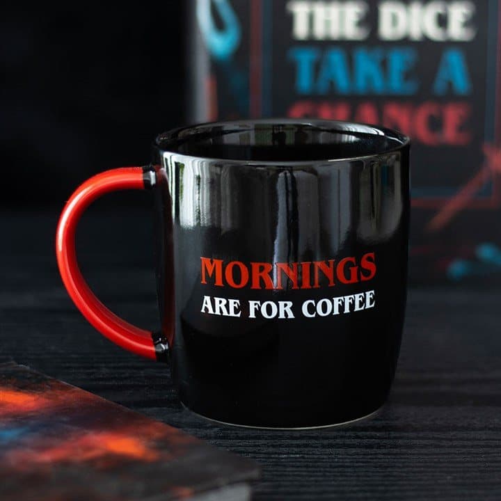 Jet-black ceramic mug with bold red and white lettering