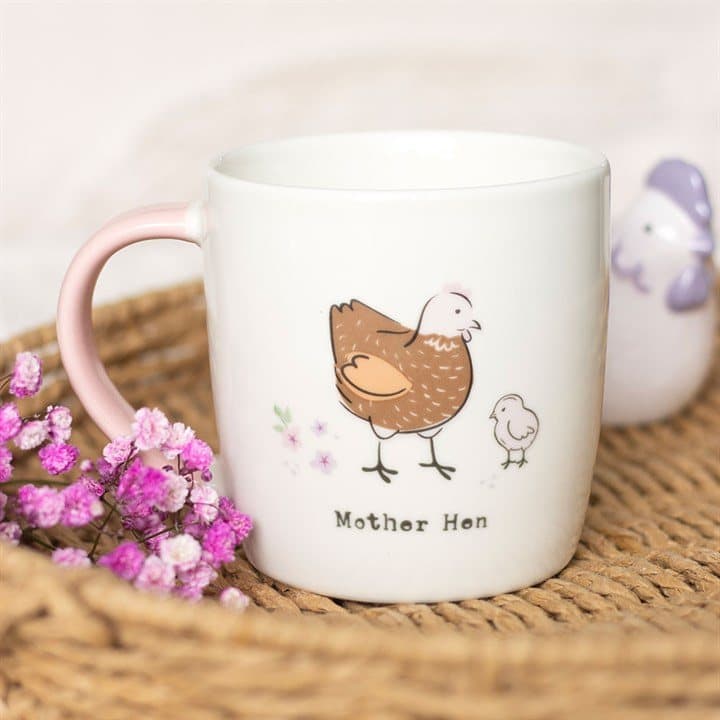 Ceramic Mother Hen mug with a pastel hen and chick design