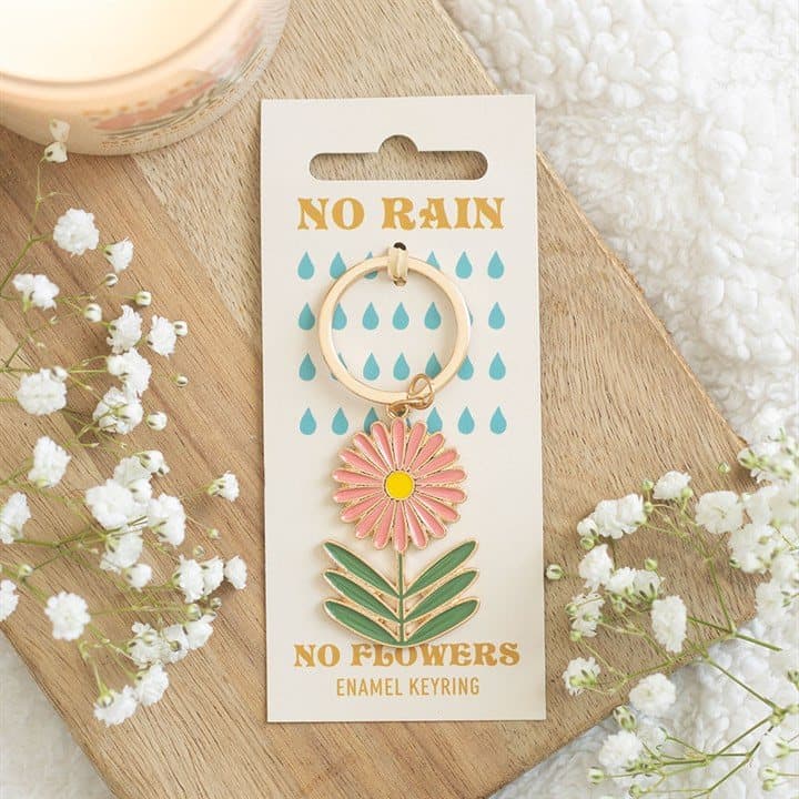 Retro enamel keyring with the No Rain, No Flowers motto