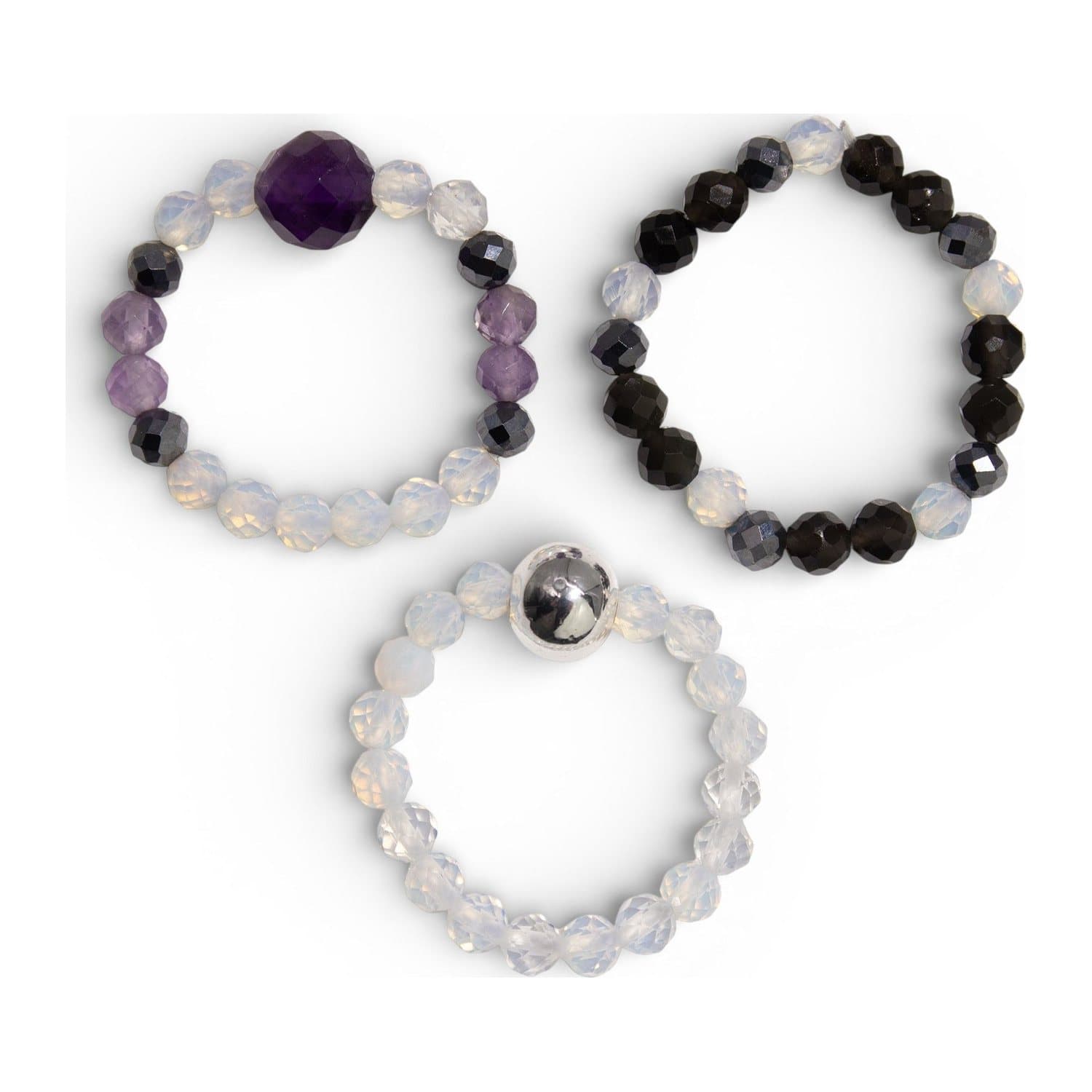 Three stacked gemstone bead rings