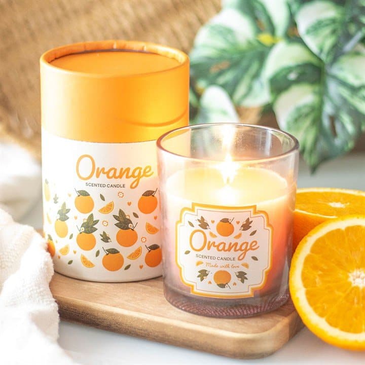 Orange print candle with a wooden lid