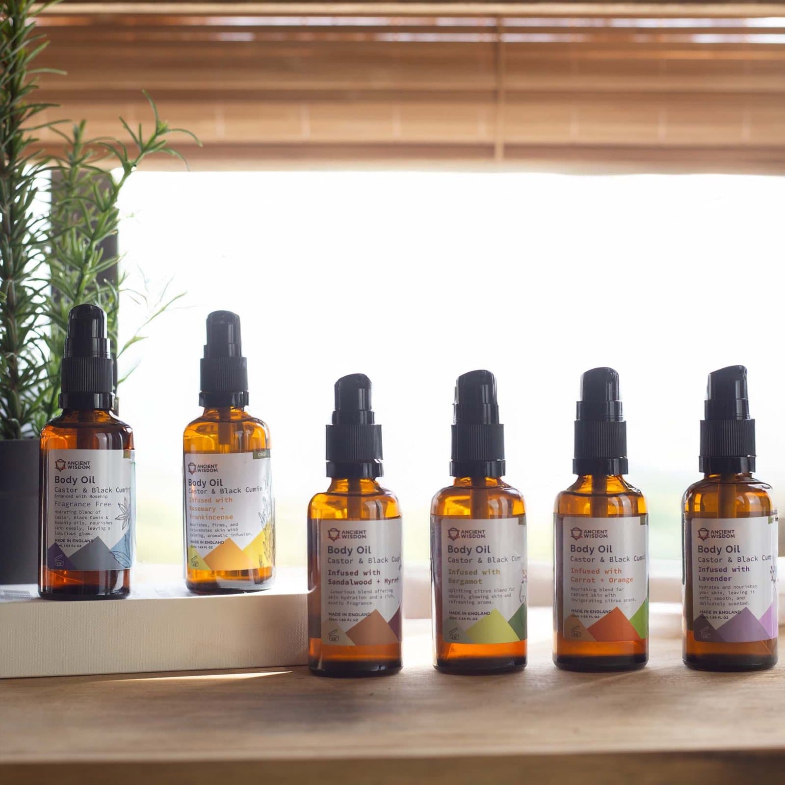 Brown bottle of bergamot organic body oil with a pump dispenser