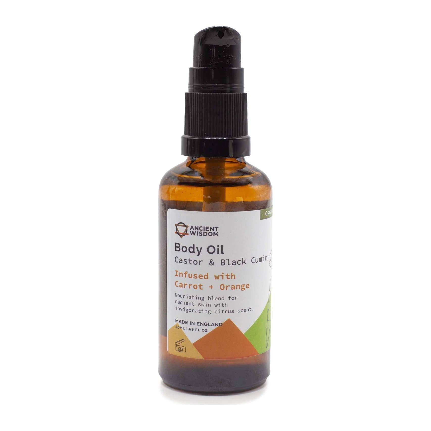 Brown bottle of carrot and orange organic body oil with a pump dispenser