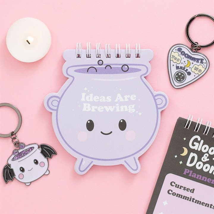 Pastel cauldron shaped notepad with Ideas Are Brewing text