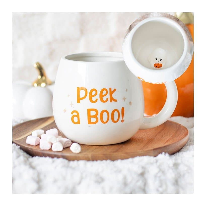 Peekaboo mug with a ghost inside