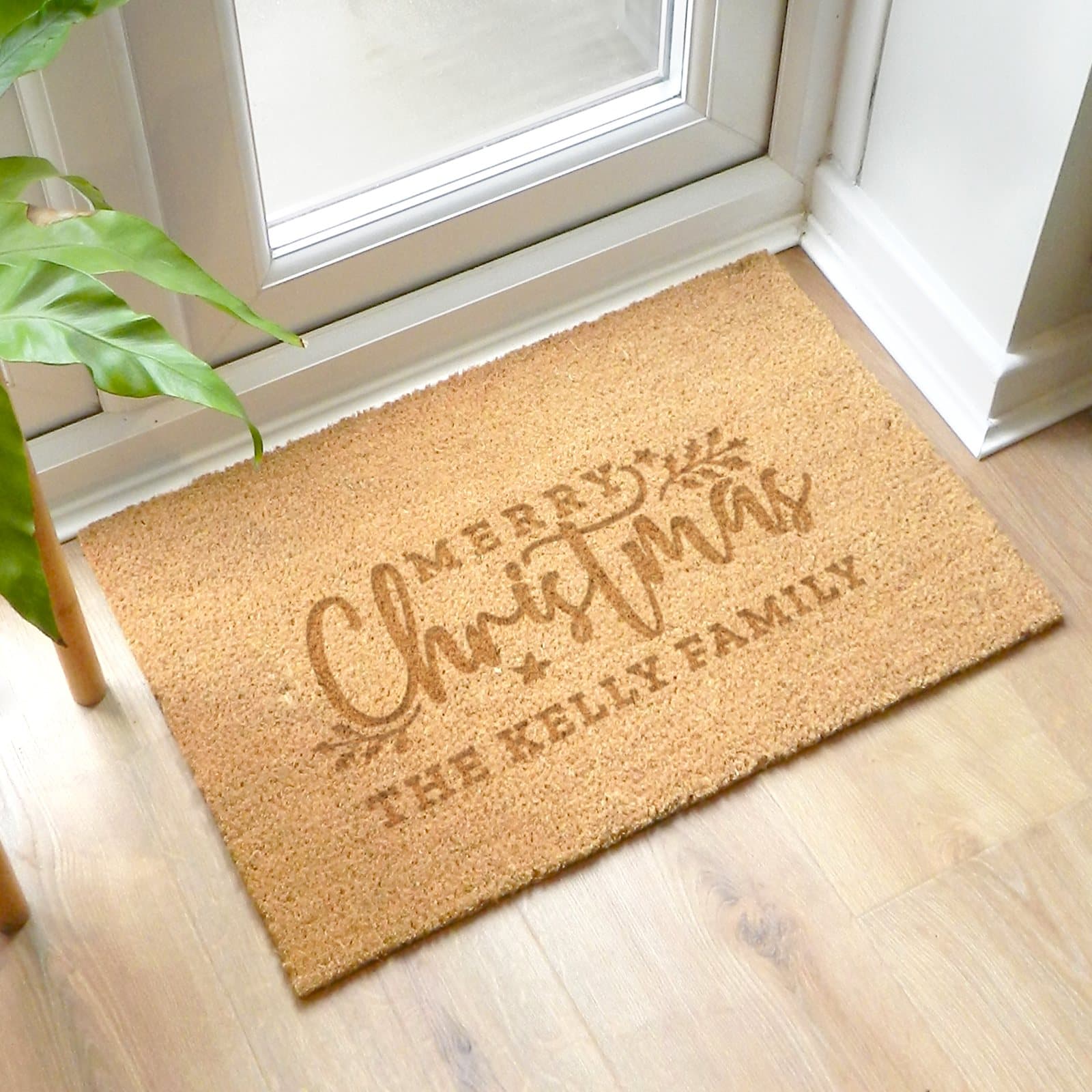 Personalised Christmas doormat with family name