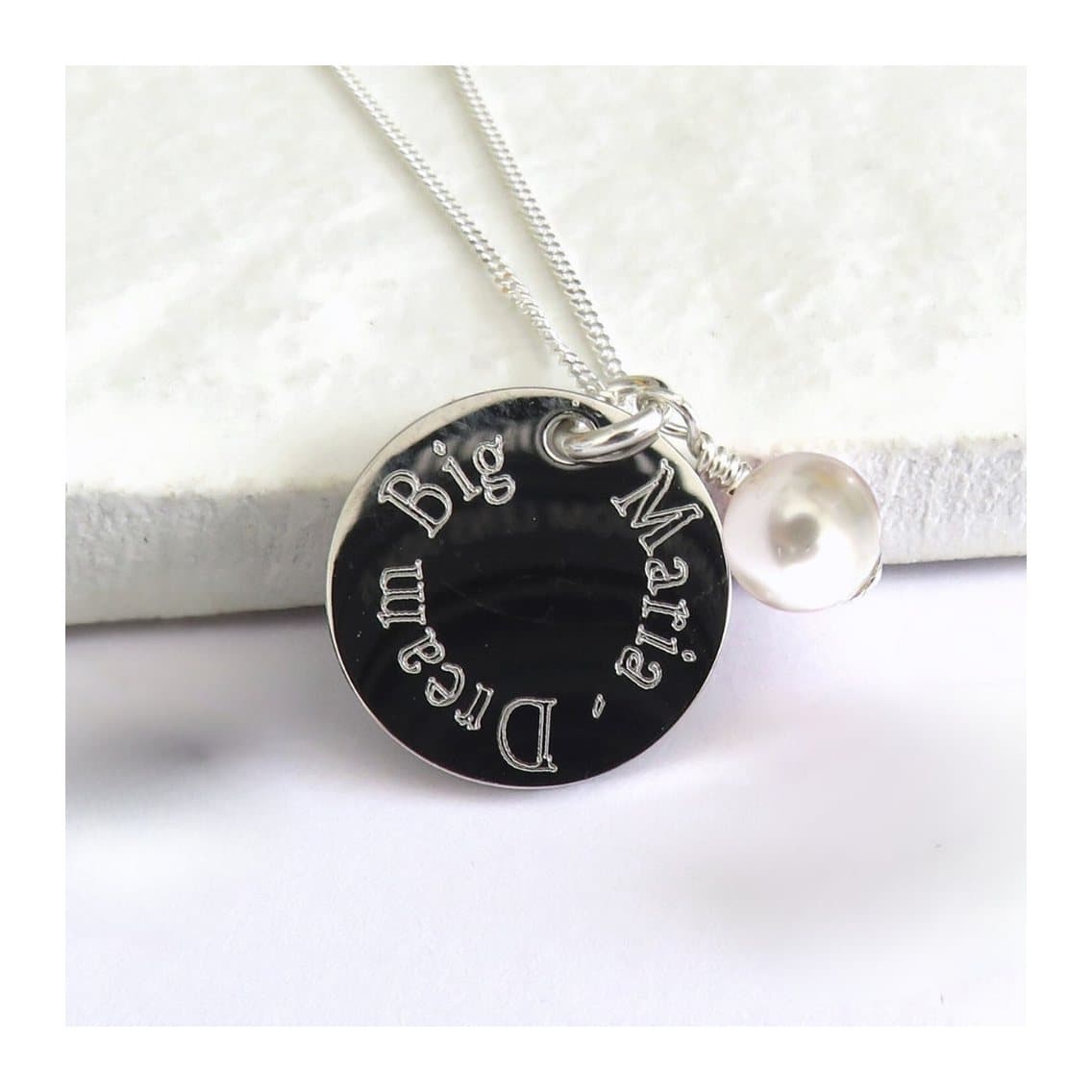 Personalised silver engraved charm necklace with an ivory pearl on a chain
