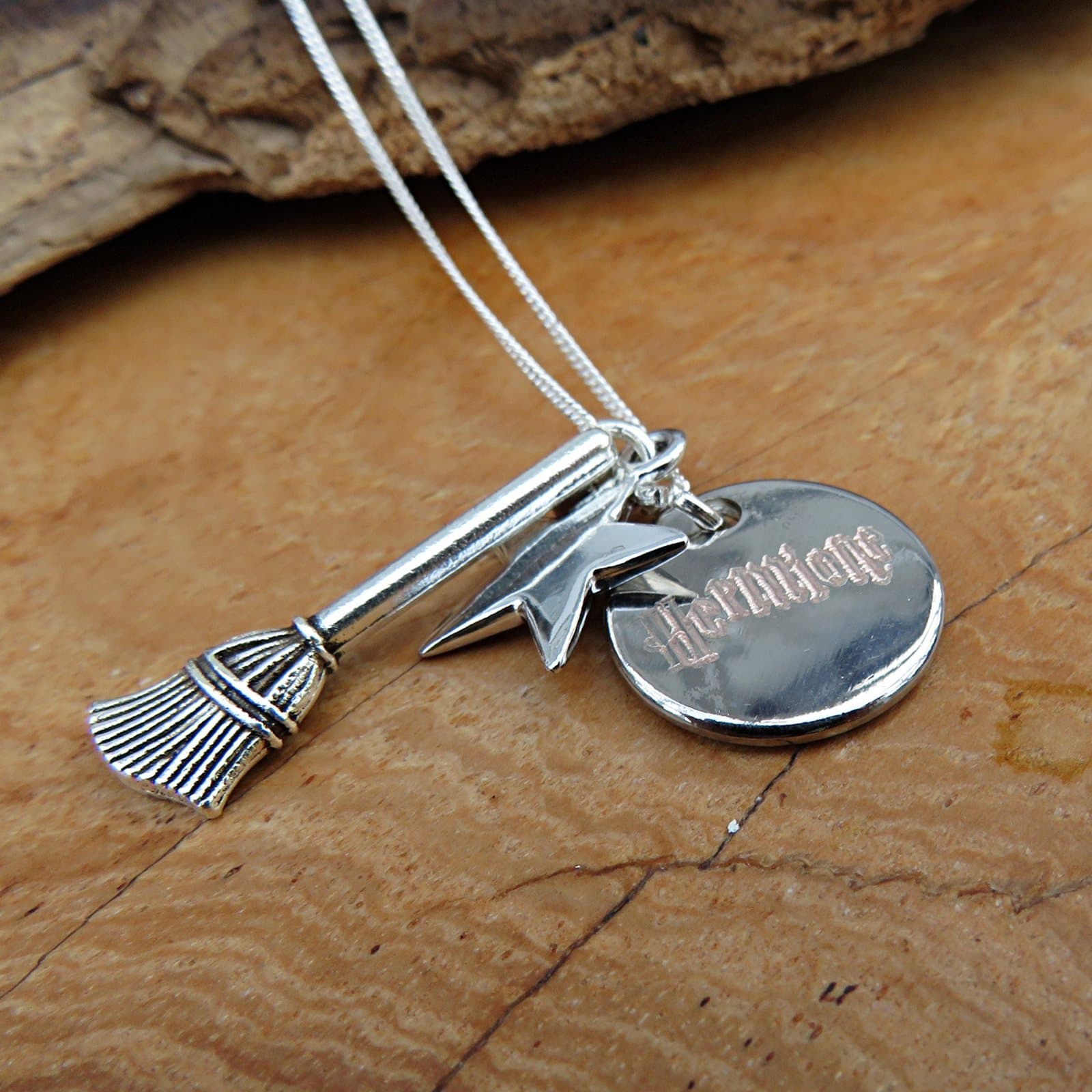 Personalised broom charm necklace with a star and an engraved round disc