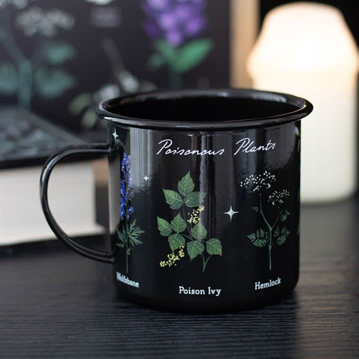 Black enamel-style mug with a poisonous plants design