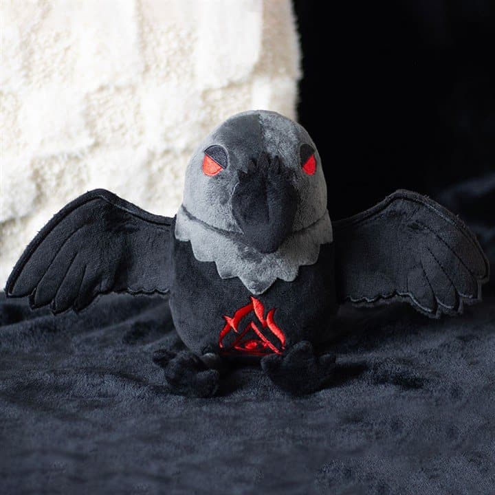 Black raven plush toy with red embroidered eyes
