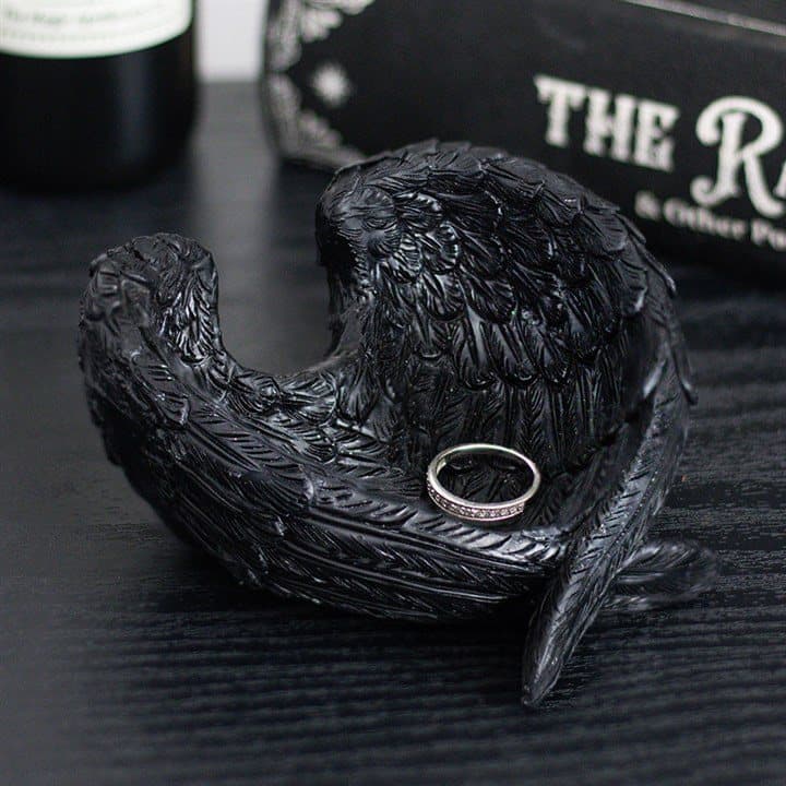 Resin trinket dish shaped like outstretched raven wings