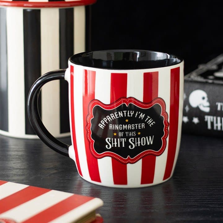 Red striped ceramic mug with a ringmaster message