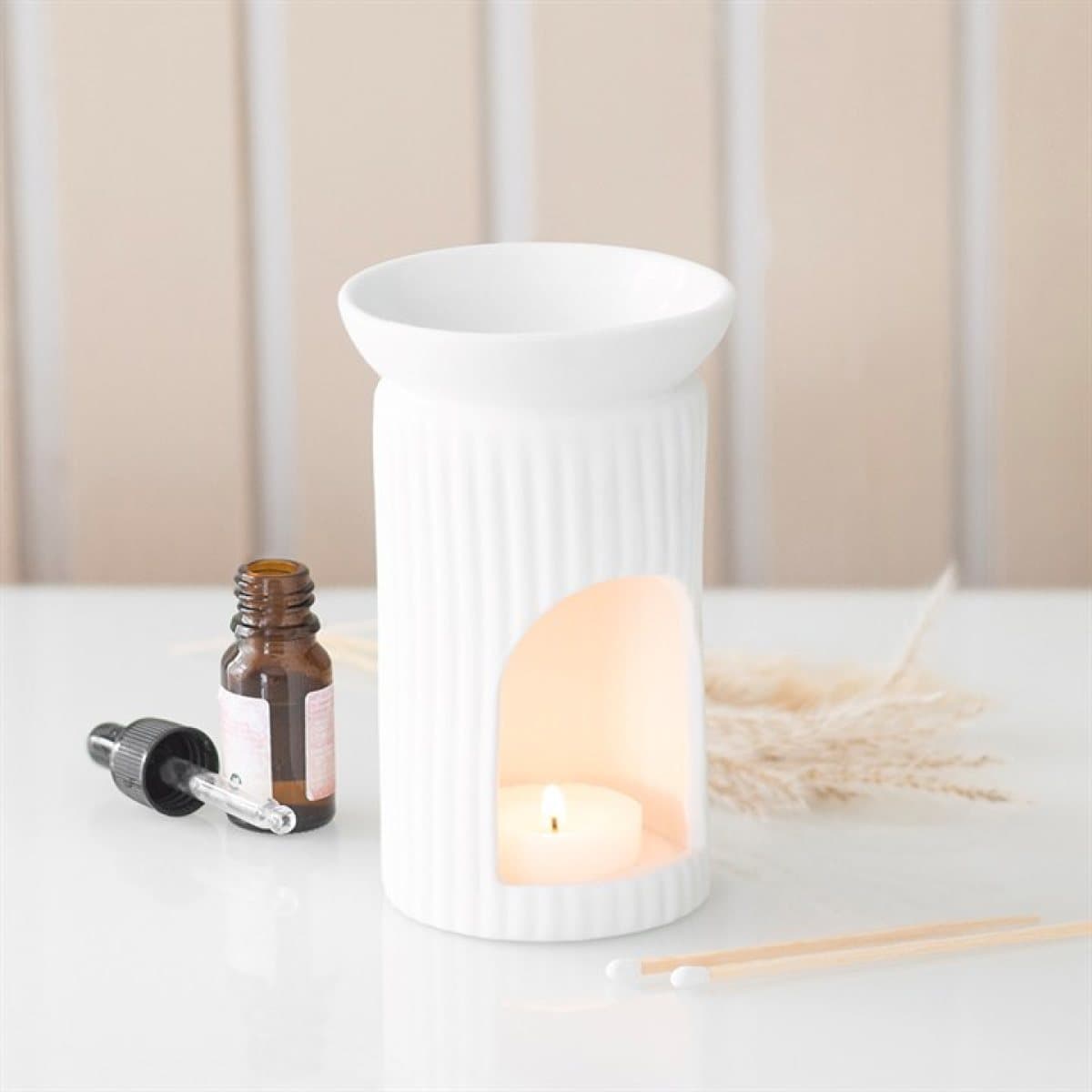 White ceramic ribbed column oil burner and wax warmer