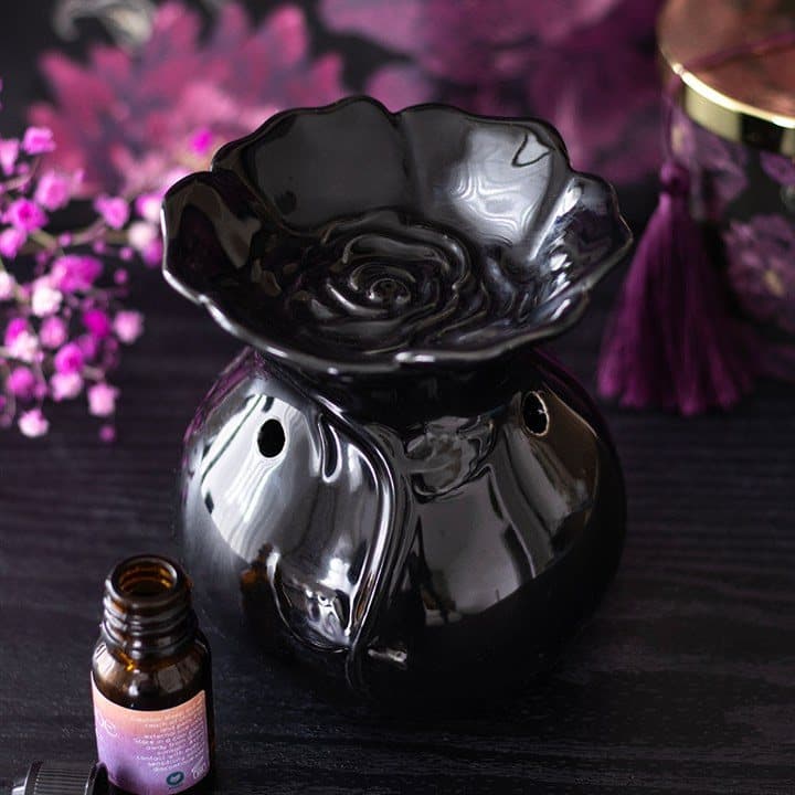 Ceramic rose oil burner in black or white