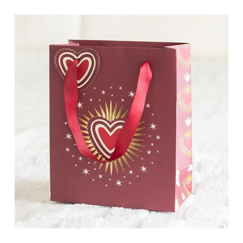 Sacred Heart paper gift bag with a bold heart design