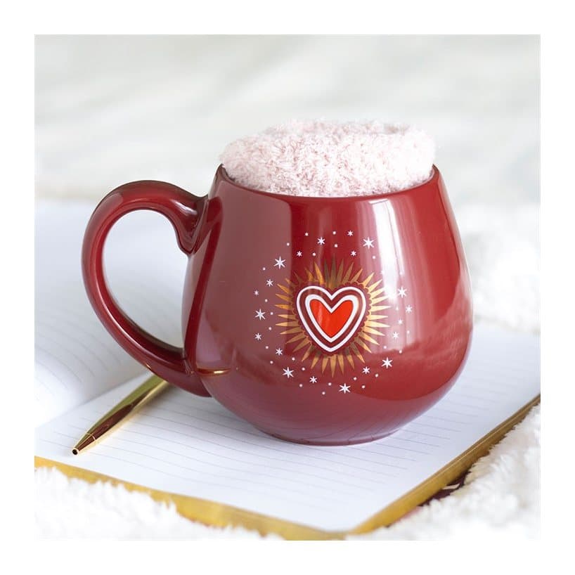 Sacred heart mug with a pair of soft pink socks