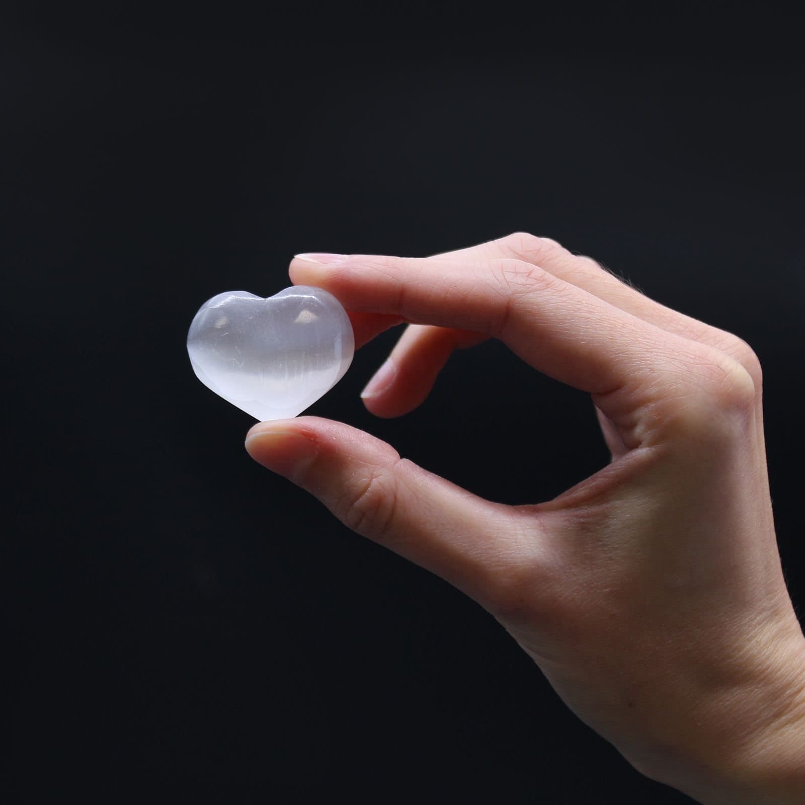 Two selenite hearts in a pack