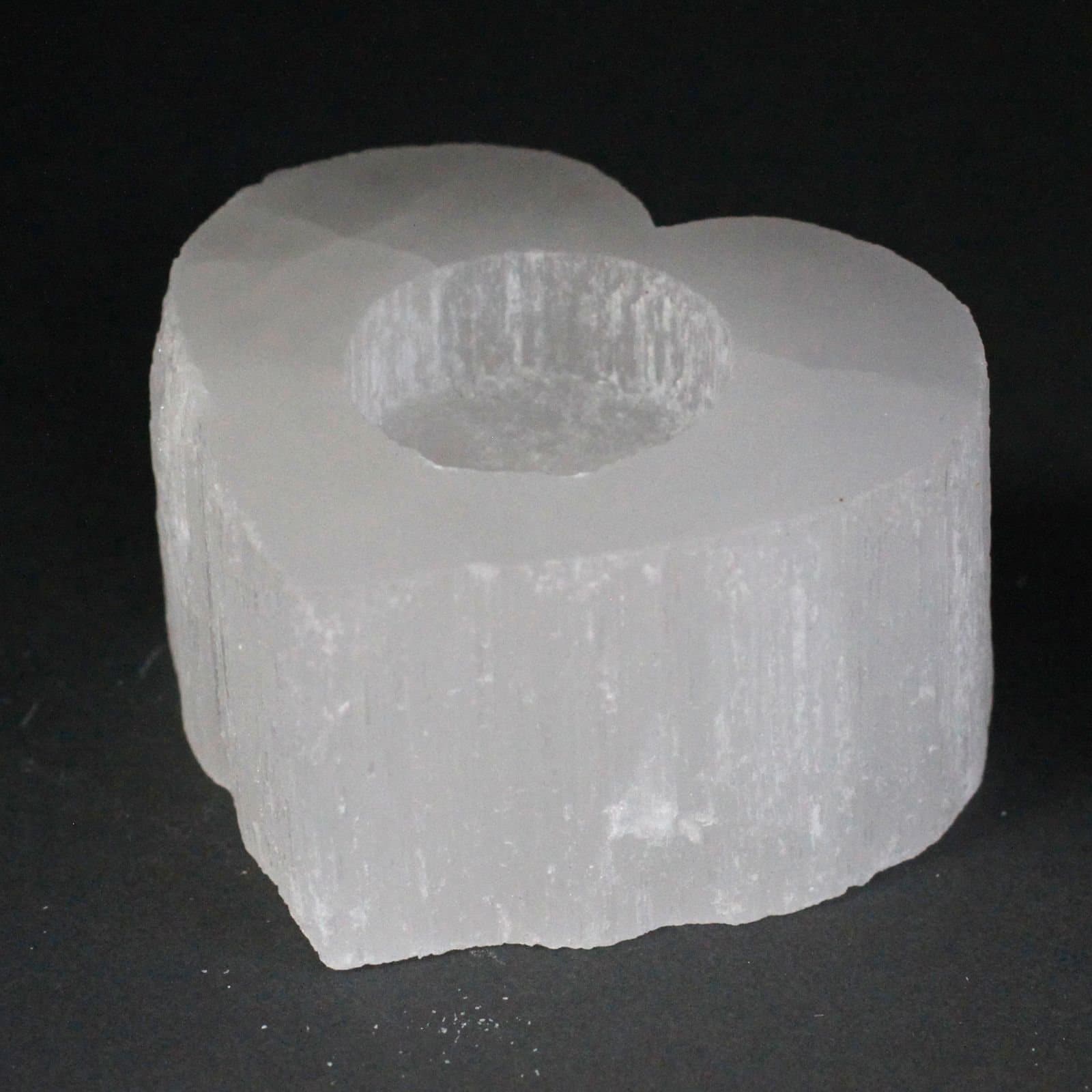 Selenite heart candle holder, translucent crystal shaped like a heart