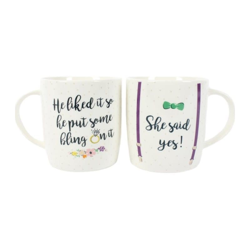 Set of two bone china mugs with She Said Yes slogans in a white box with a window