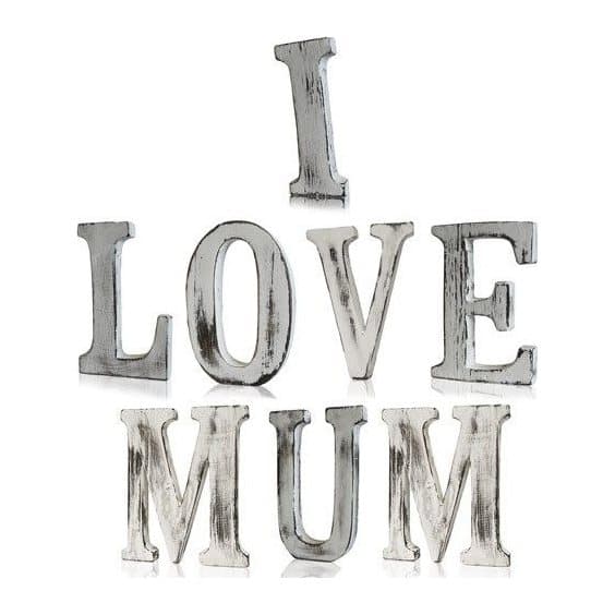Whitewashed wooden letters spelling I LOVE MUM
