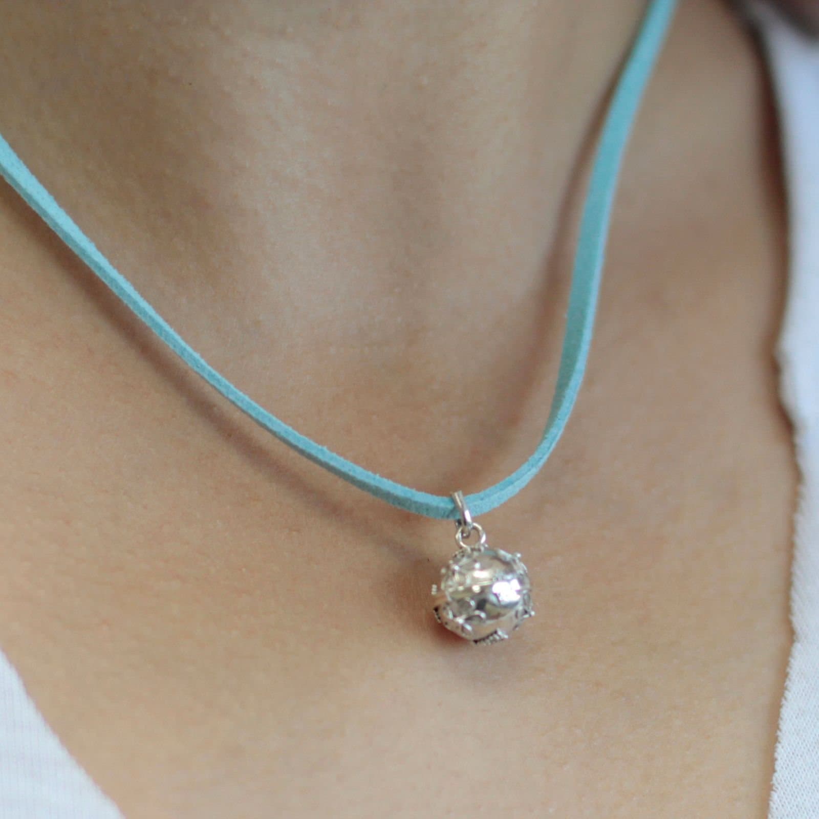 Sterling silver angel bell pendant