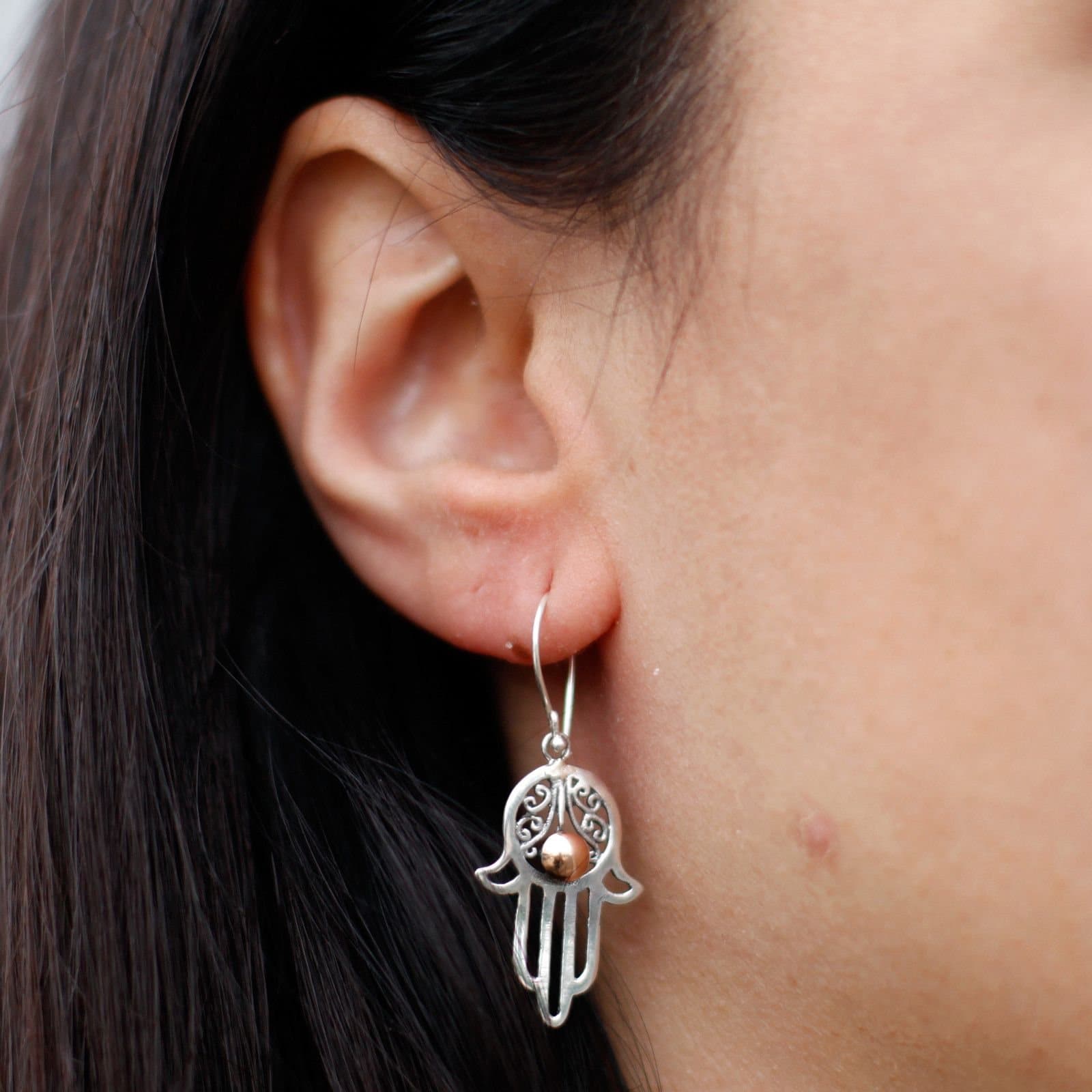 Silver and gold hamsa drop earrings with hook fittings