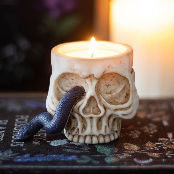 Resin skull tealight holder with a snake