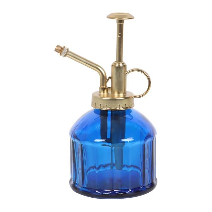 Small blue glass plant mister with a gold metal pump spray