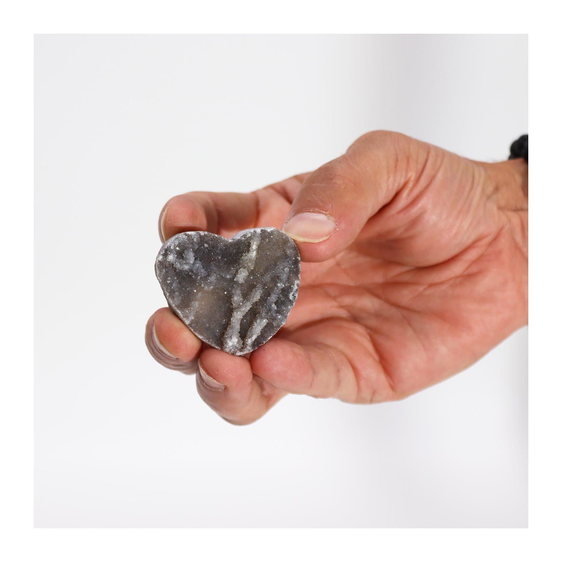 Heart-shaped carving in natural calcite