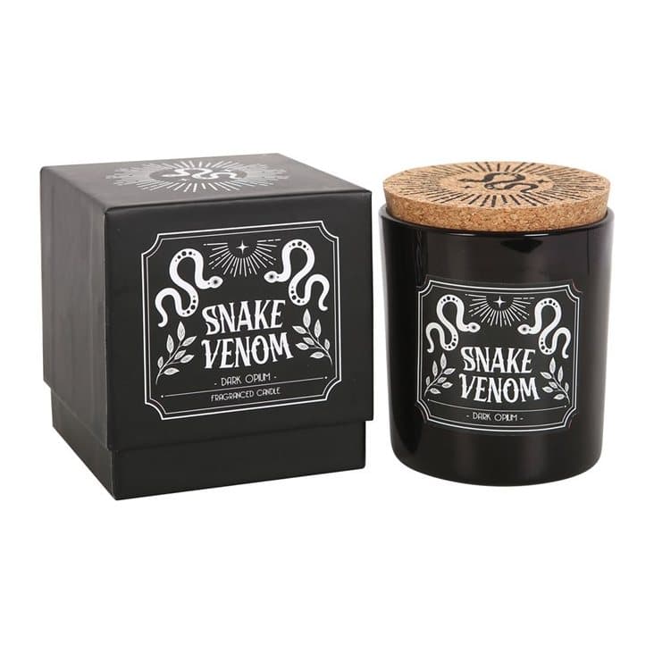 Snake Venom glass jar candle beside its sliding box