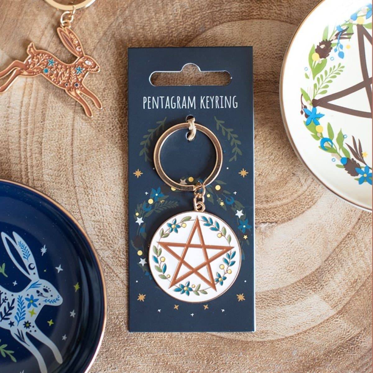 Solstice Wreath keyring with pentagram, winter foliage and celestial details