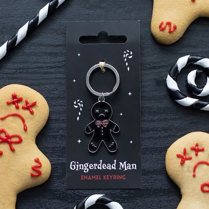 Spooky gothic gingerbread man keyring on a cardboard back with Euro hook