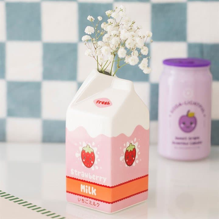 Ceramic strawberry milk carton vase with a smile